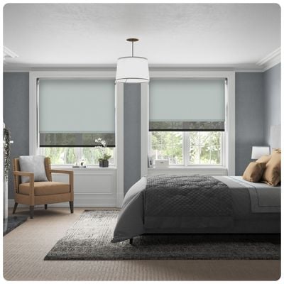 double roller blind in a bedroom window