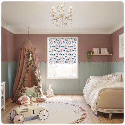 A butterfly-print children's roller blind in a child's room 