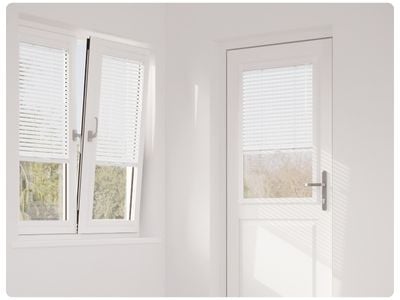 White wooden shutters in dining room 