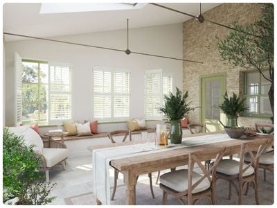 Modern living room with stick-on blinds for patio doors. 