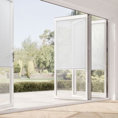 White, aluminium, metal Venetian blinds fitted to bifold doors