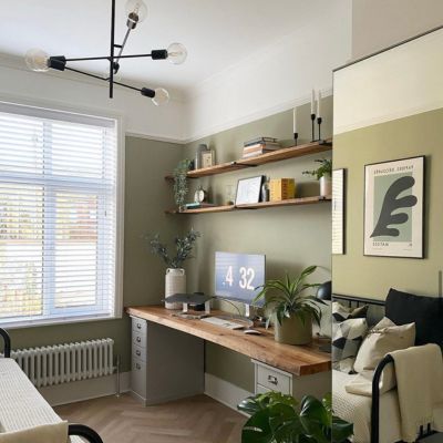 white wooden blinds in a sage green office 