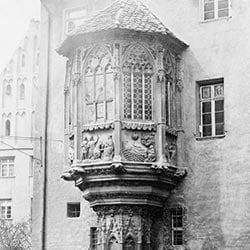 A grey and white image of the medieval St Sebaldus Parsonage oriel bay window, which is in Nuremberg