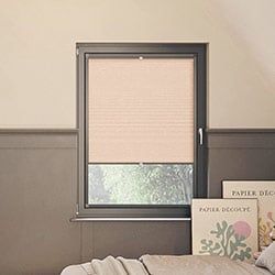 a Picture of a pink leto blush perfect fit blind in a modern bedroom