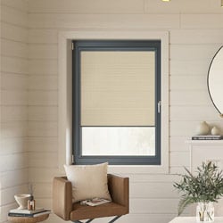 a skylar camel, beige roller blind in a contemporary cream living room