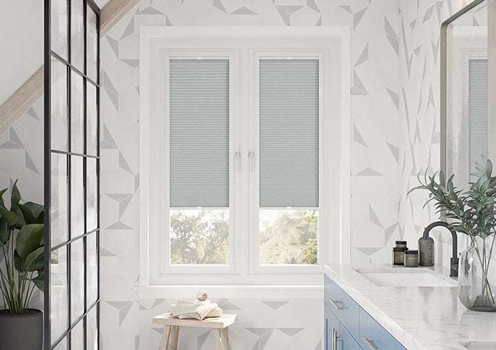 a grey perfect fit honeycomb blind in a modern bathroom, Stellar Gris