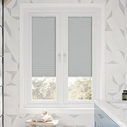 a grey perfect fit honeycomb blind in a modern bathroom, Stellar Gris