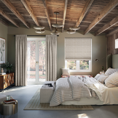 Green bedroom with blackout Roman blind and curtains.