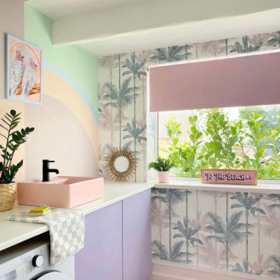 Pastel colourful kitchen with a baby pink roller blind.