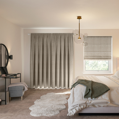 Neutral bedroom with floor-to-ceiling blackout curtains 