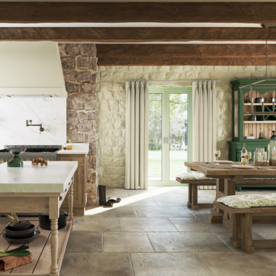 Rustic farmhouse style kitchen / diner with exposed beams and brick. 