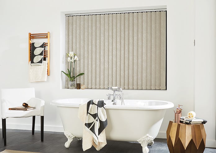 A brown patterned vertical blind in a modern bathroom