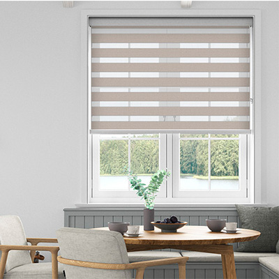 Taupe striped day night roller blind shown in kitchen/dining area