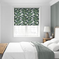 A beautiful tropical pattern roller blind in a grey bedroom