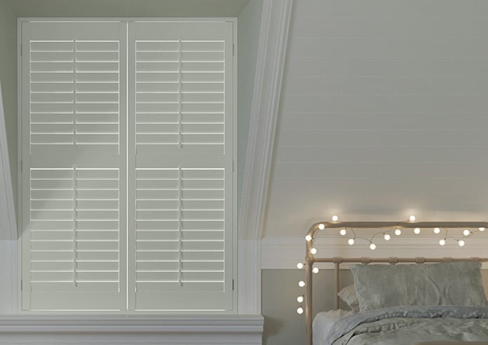 A plantation shutter in a night time environment
