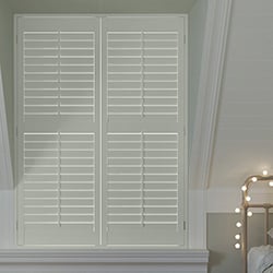 A plantation shutter in a night time environment