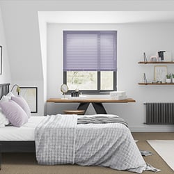 A bedroom with a beautiful purple aluminium venetian blind