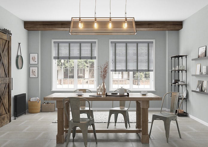 A dining room with a double grey taped wooden blind look