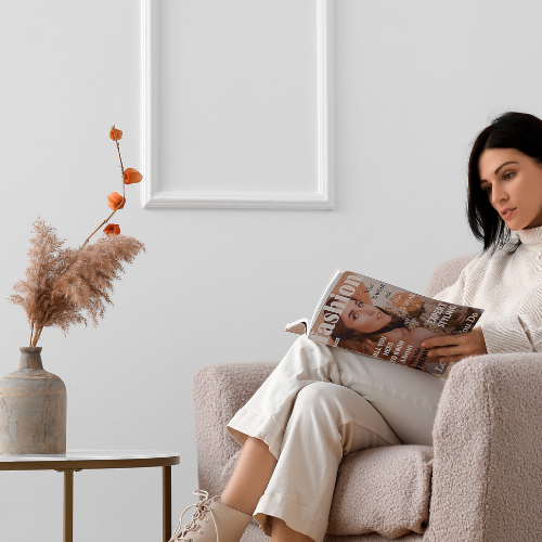 lady looking at magazine 