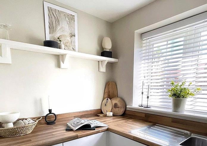 An image showing a wooden blind in a kitchen