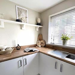 An image showing a wooden blind in a kitchen