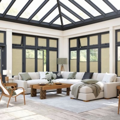 A conservatory with Perfect Fit blinds fitted to anthracite windows