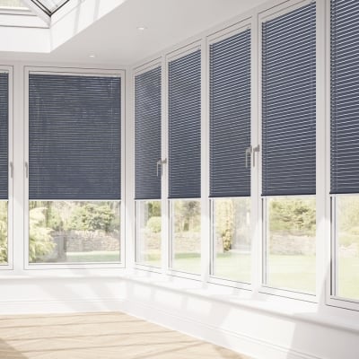 Grey venetian no drill blinds fitted to conservatory windows 