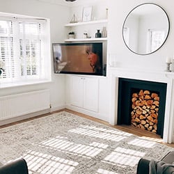 A beautfiul modern home with a taped wooden blind