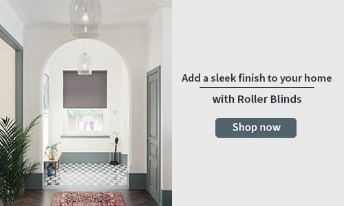 Roller blind banner with a grey roller blind in a window