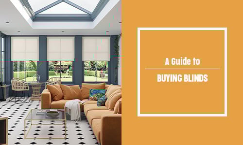A guide to buying blinds banner with a conservatory with three cream rollers