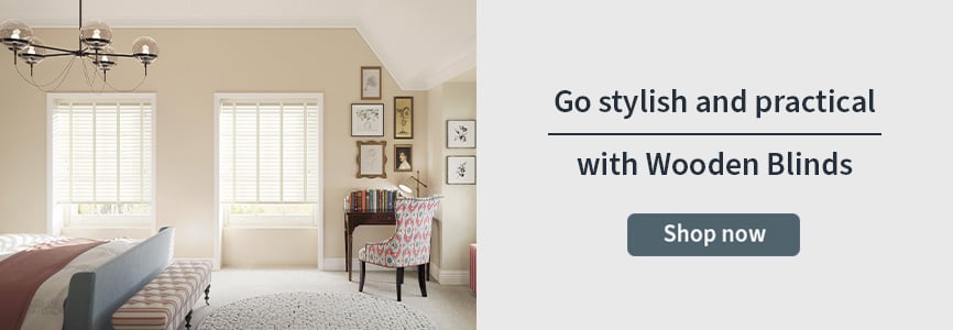 Wooden Blind banner with a white taped wooden blind in a bedroom