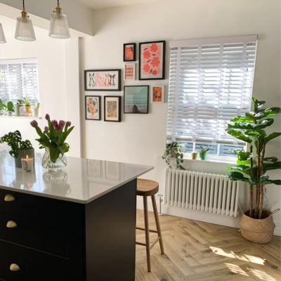 white wooden blinds fitted outside the recess 