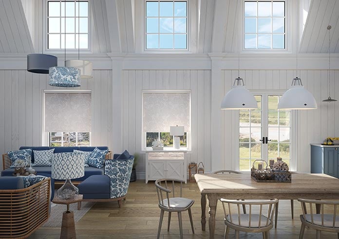 A floral roller blind in a large open living space