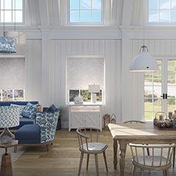 A floral roller blind in a large open living space