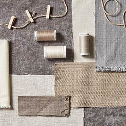 A fabric mood board with neutral colours