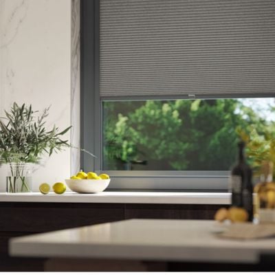 Dark grey, pleated, Perfect Fit Blinds with an anthracite frame on an anthracite kitchen window.