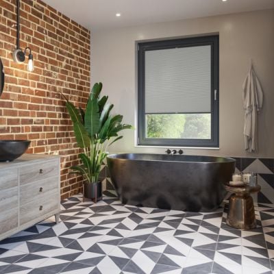 Grey thermal blackout blind in bathroom.