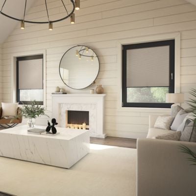 White no-drill roller blind in modern neutral living room. 