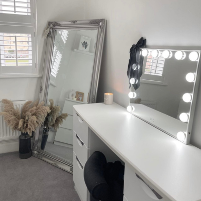 White and grey dressing room with white wooden shutters 