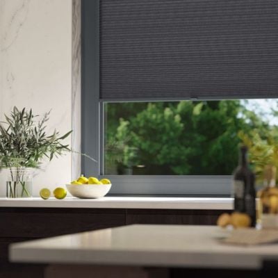a black, stick-on blind in a contemporary kitchen