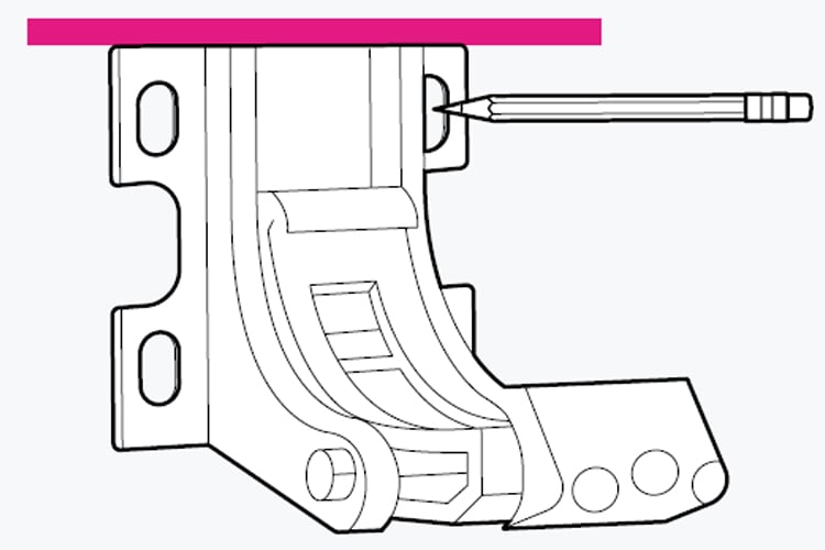 An image showing awning bracket holes being marked.